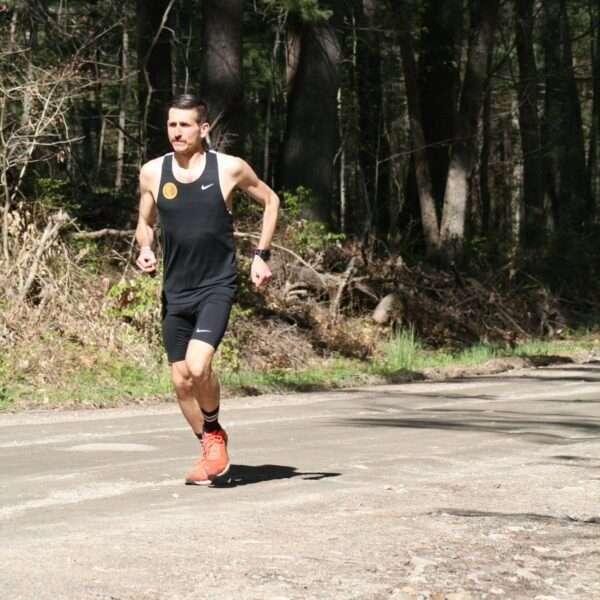 Coach Chris performing a base building run while marathon training.