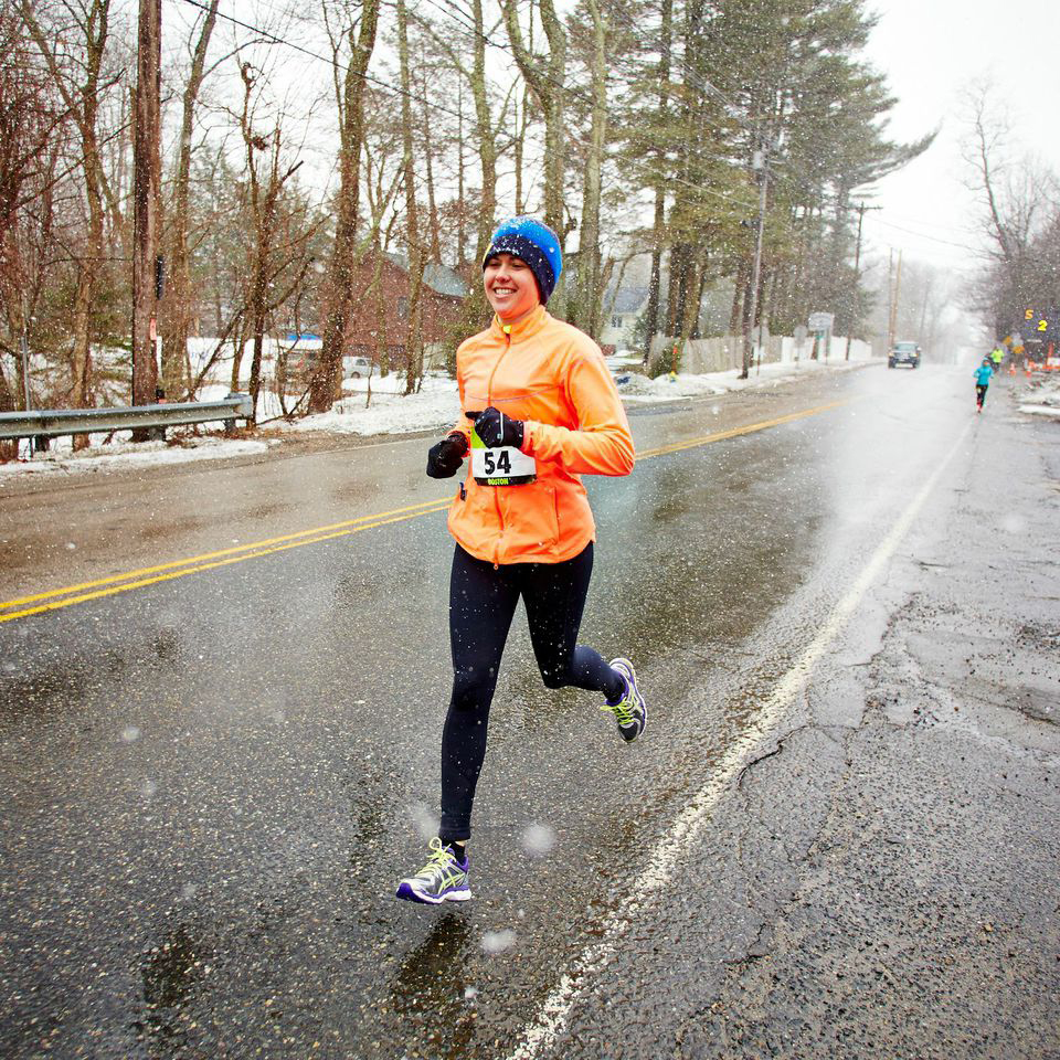 Coach Erica training in the Winter for the Boston Marathon during a snow storm.