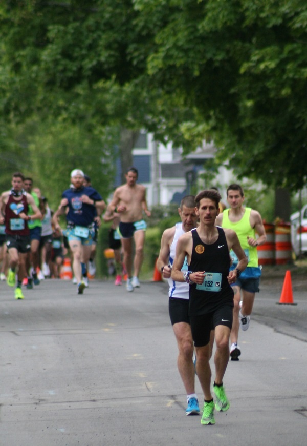 Coach Chris Knighton running the 2021 Newport Rhode Island Marathon.