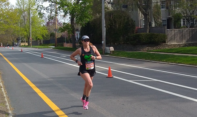 Coach Erica Knighton Running at the Providence Half Marathon 2021