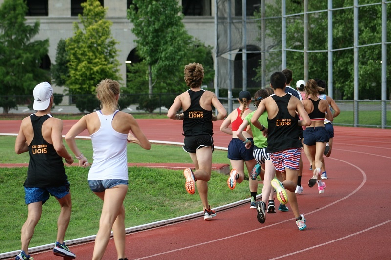 Knighton Runs athletes racing the 1-mile on the track.
