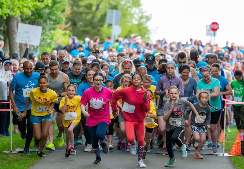 Photo of kids running a race.