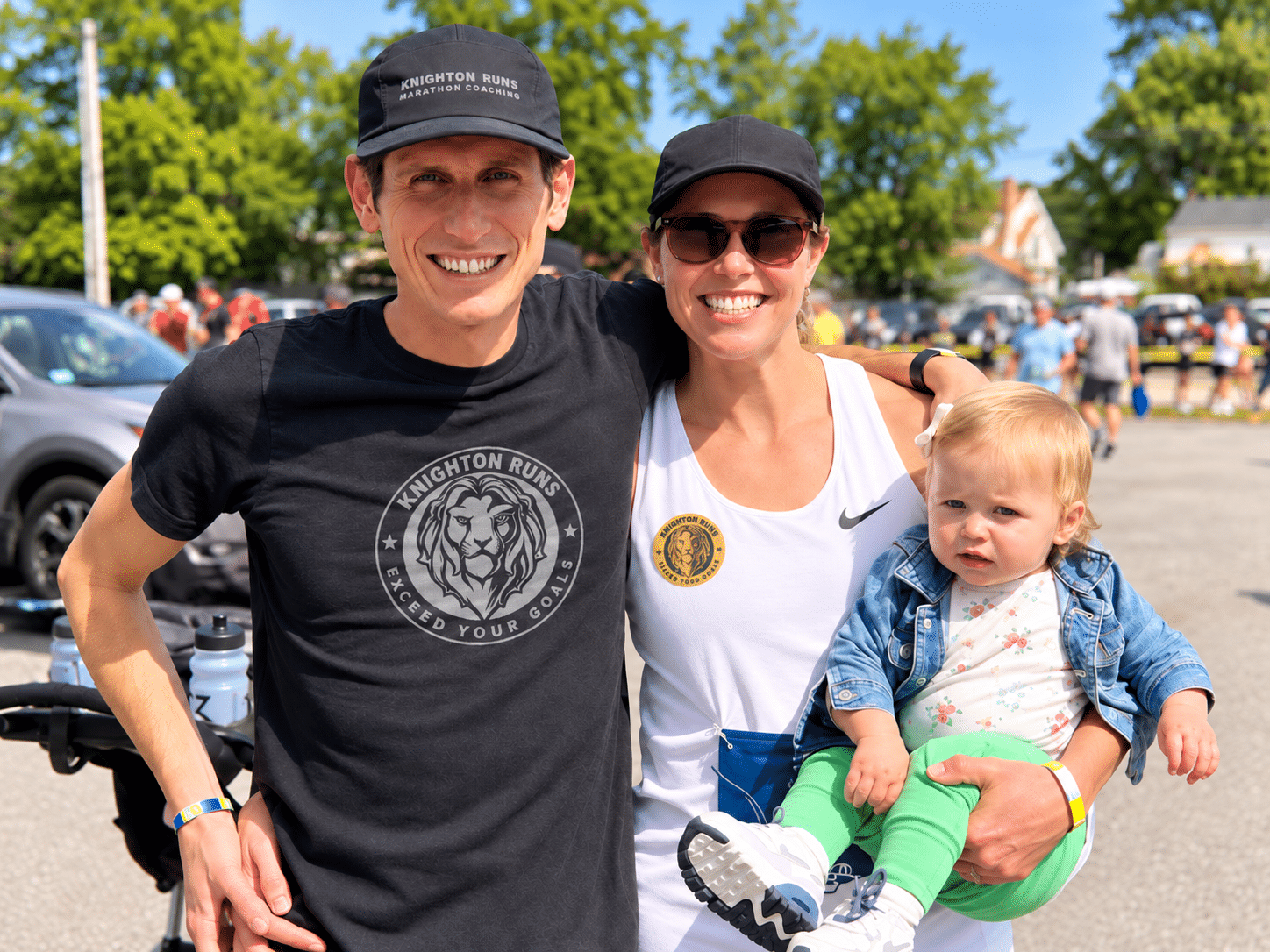 Chris and Erica Knighton with their daughter at a running event